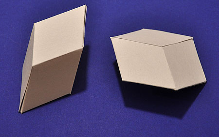 golden rhombohedra made of paper